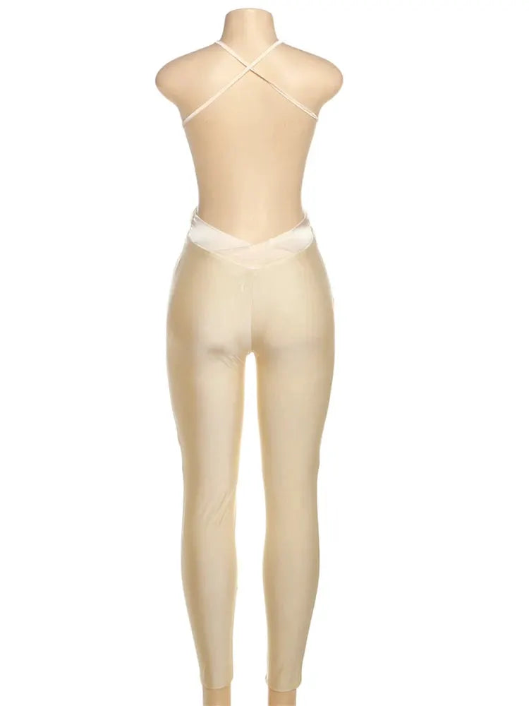 Jumpsuit for women, cream satin with criss-cross back straps, backless, skinny fit.