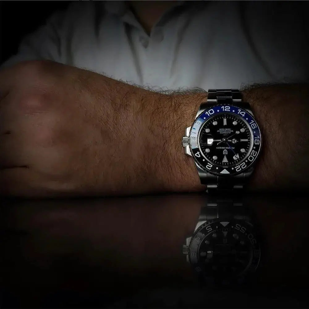 PAGANI DESIGN men's GMT watch with stainless steel bracelet, black dial and blue/black bezel