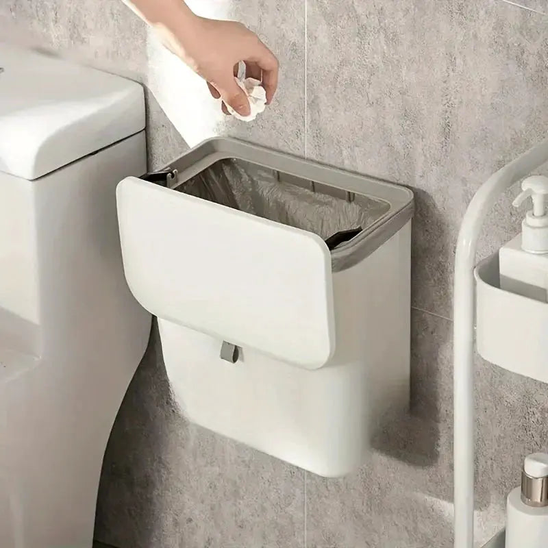 Simples Market white wall-mounted trash bin, space-saving durable plastic for kitchen.
