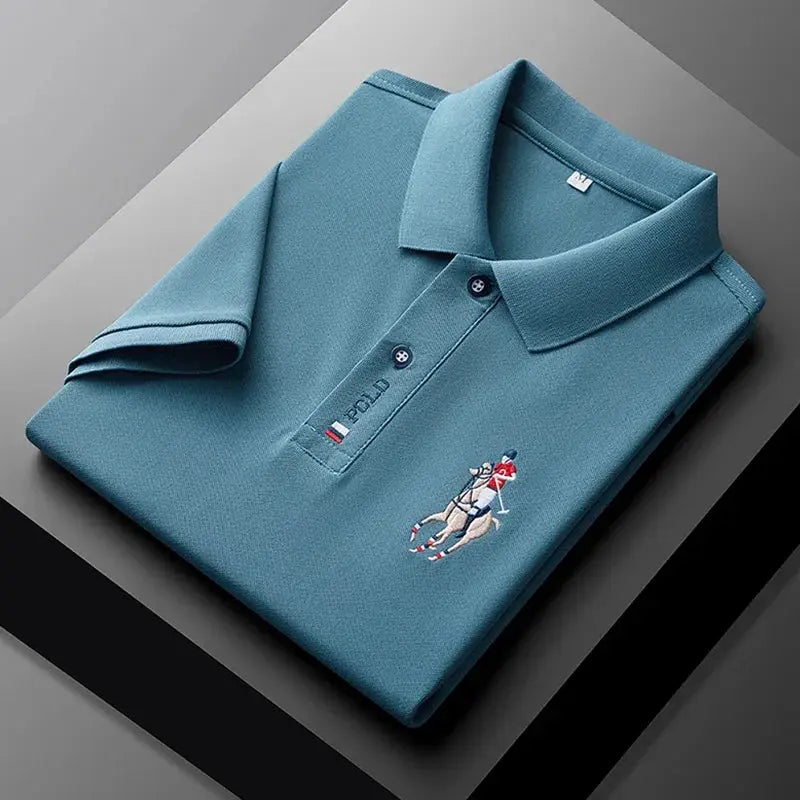 Men's polo shirt in blue with embroidered POLO rider logo and chest patch