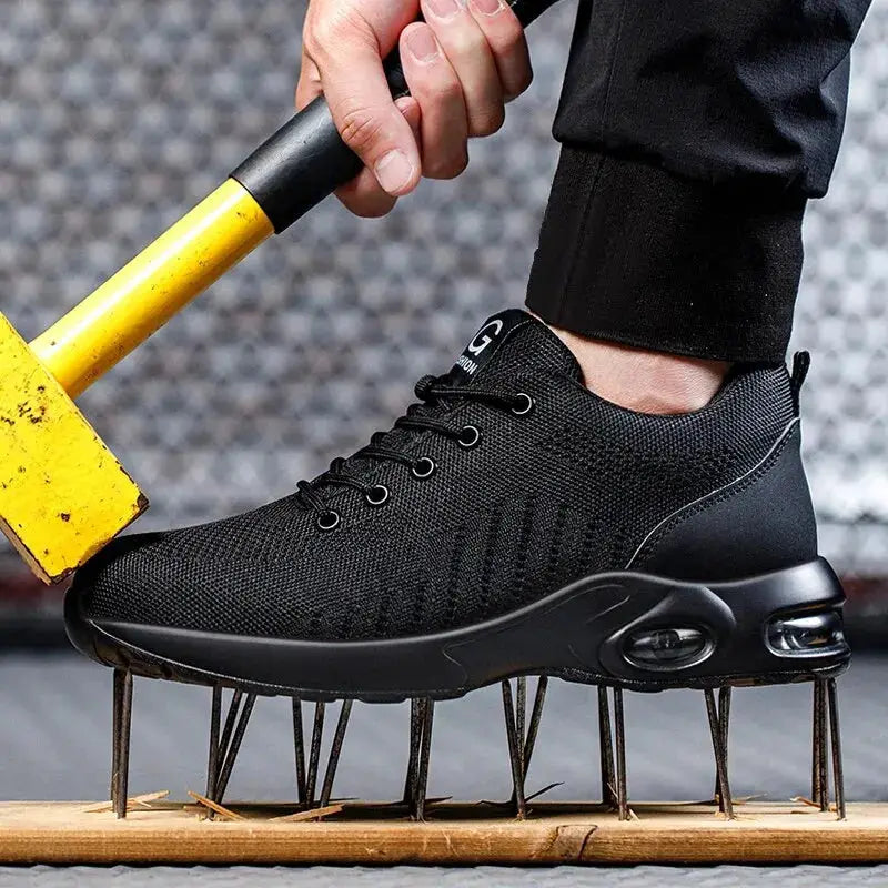 Air cushion work safety shoes, black breathable mesh sneakers with steel toe and anti-puncture sole.