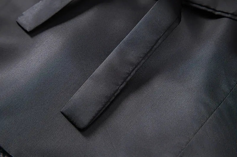 Men's waistcoat lapel close-up in dark navy solid fabric