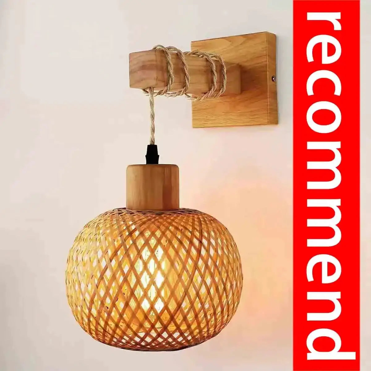 Bamboo lantern wall lamp with natural hand-woven rattan lattice shade mounted on a wooden wall plaque