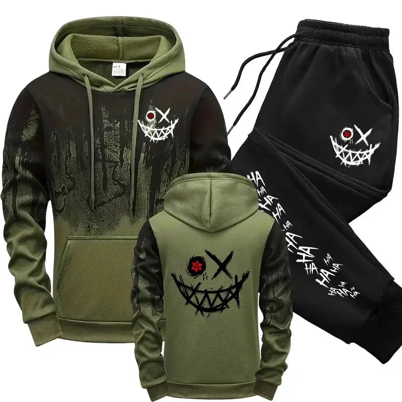 Men's tracksuit hoodie and pants set in olive and black by Simples Market with graffiti smiley graphic.