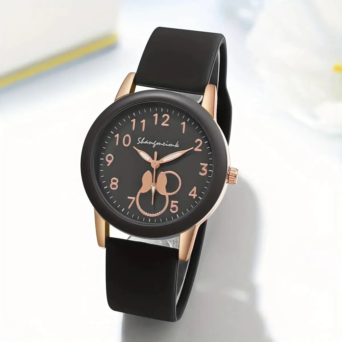 Casual Round Pointer Women Quartz Watch with black silicone band and rose-gold case