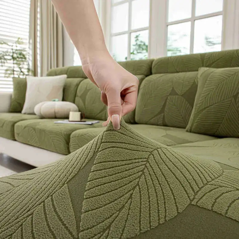 Thick plush sofa cover, elastic and removable, olive green with textured leaf pattern for living room protection