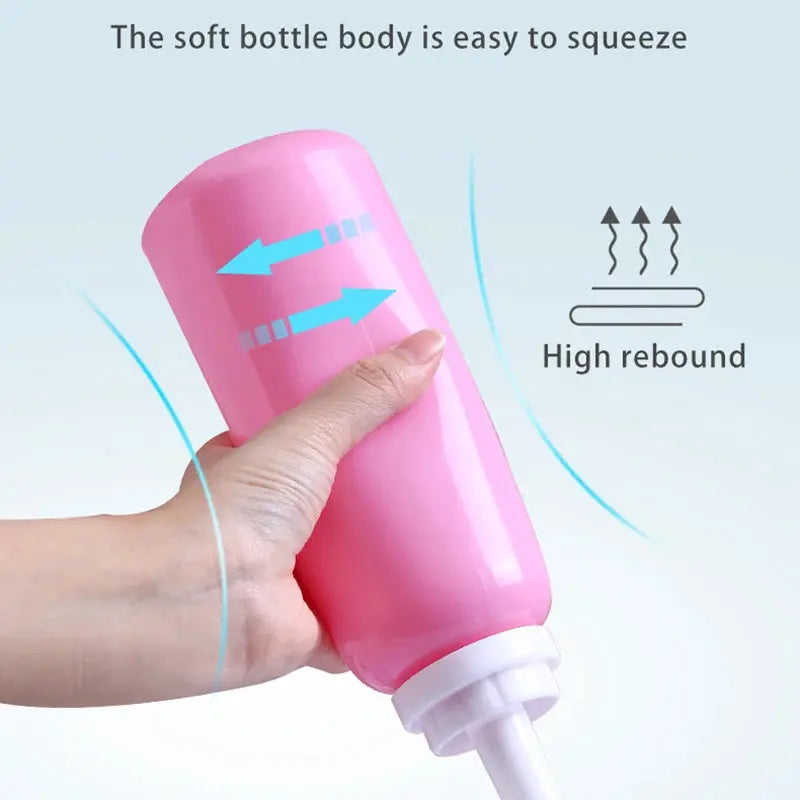 Pink 500ml portable handheld bidet spray for travel and baby cleansing