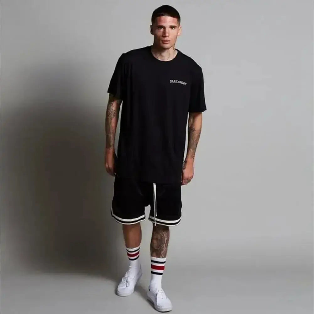 Men's basketball shorts, black with white trim, mesh quick-dry fabric