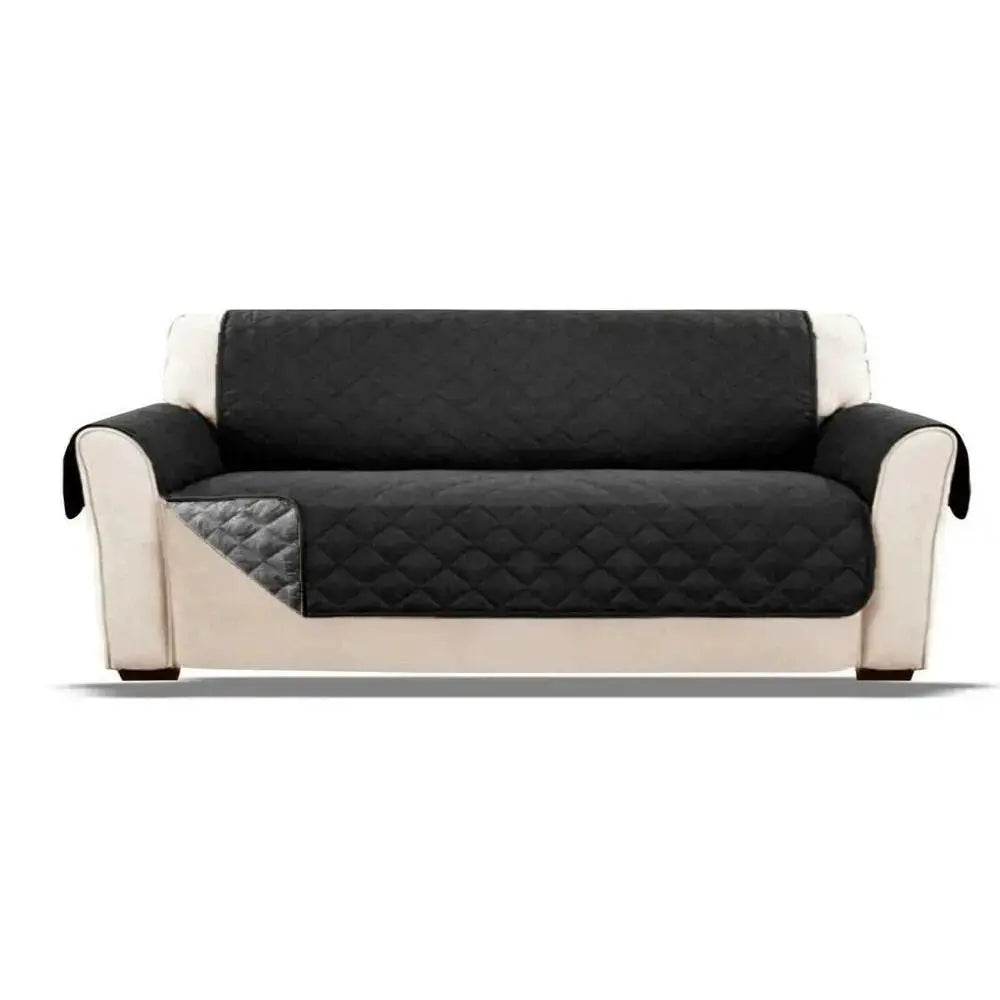 Soft Dacron quilted sofa cover for 2–3 seater, dark gray anti-wear slipcover on beige sofa