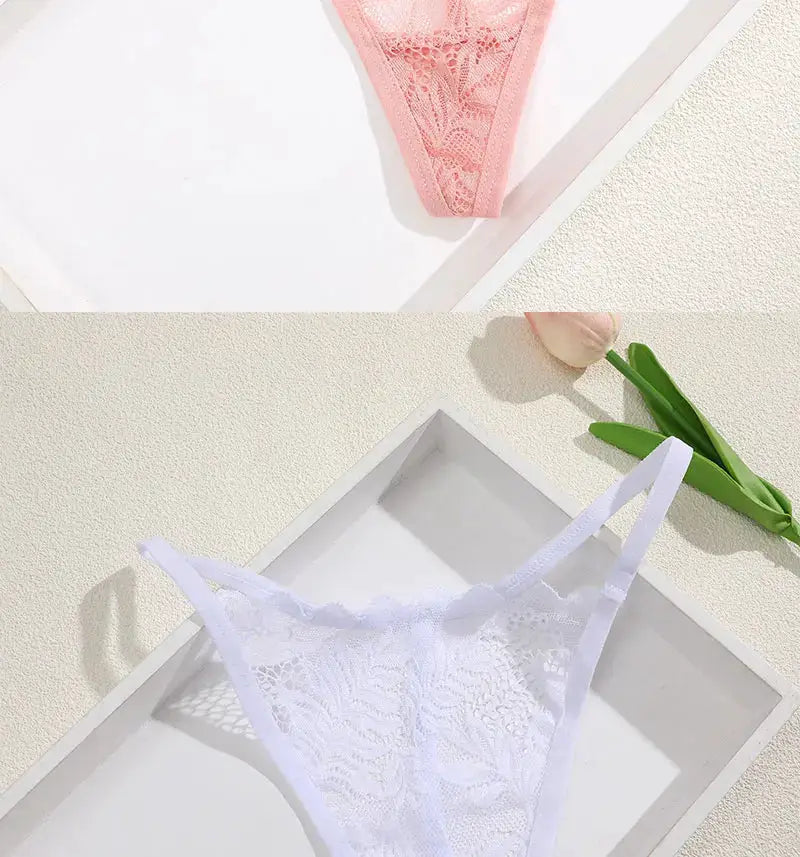Lace thong underwear set, pink and white floral lace, two pieces on a tray
