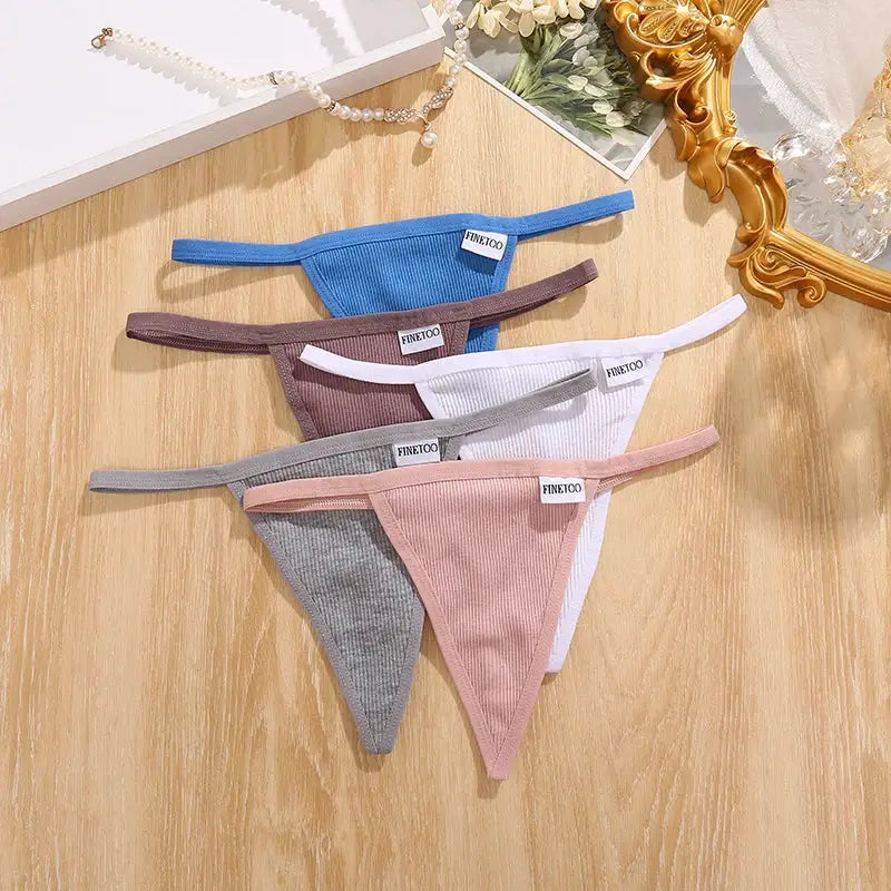 7pc women's seamless cotton low-rise thong set in assorted solid colors with Finetoo tags visible