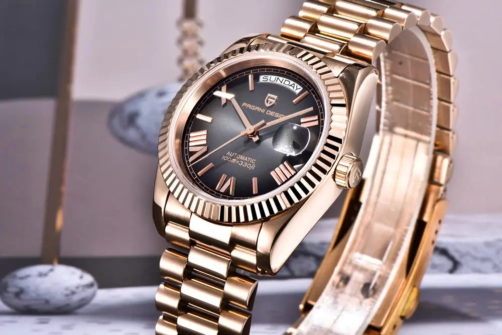 Pagani Design gold-tone men's automatic wristwatch with black dial, day window and fluted bezel.