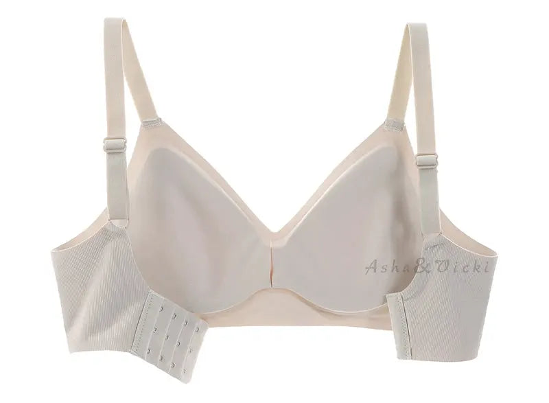 Latex cup bra in beige with soft support and wide side panels