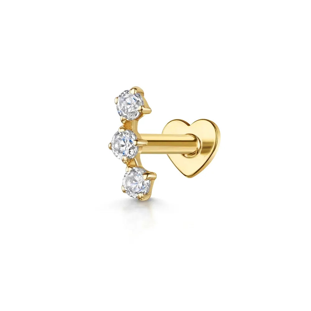 AIDE gold-tone heart-backed helix piercing earring with three round zircon stones.