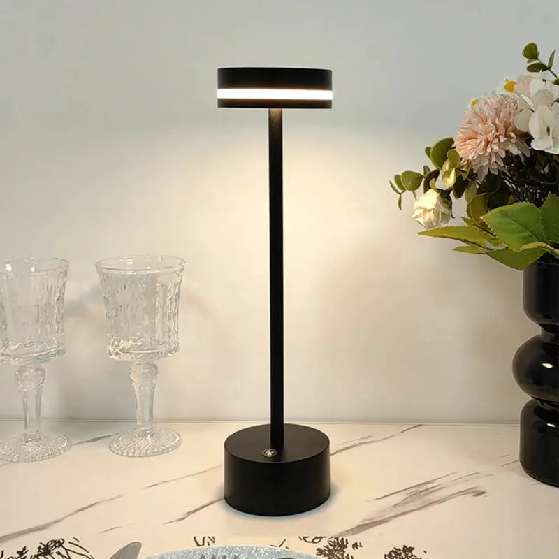Touch small night light LED desk lamp in black aluminum by Simples Market with adjustable brightness.