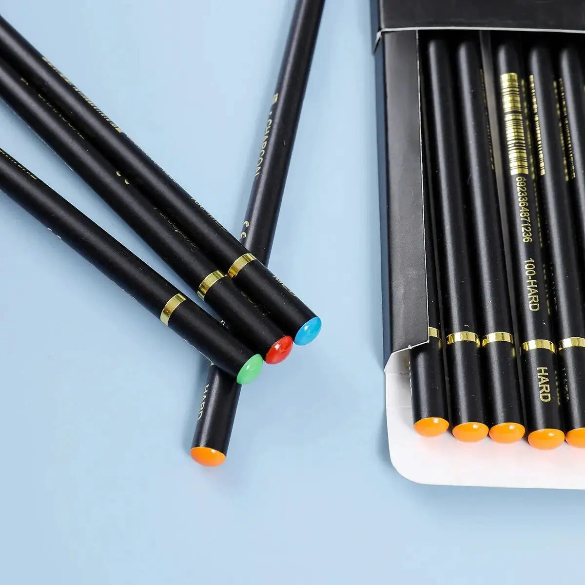 Simples Market 12pc charcoal pencil set for drawing and shading with color-coded ends, shown in case