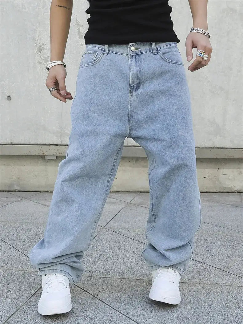 Men's baggy denim jeans, light-wash, oversized wide-leg streetwear style.