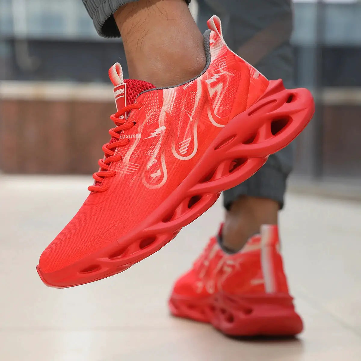 Unisex red mesh running shoes pair by Simples Market with breathable upper and cutout sole