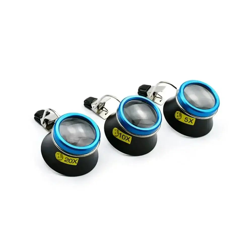 Four clip-on magnifying glasses with blue rims for watchmaking; 5x, 10x and 20x magnification for jewelry repair