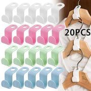 Simples Market mini wardrobe hanger connectors, 20-pack in white, pink, green, blue; plastic cascading coat organizers.