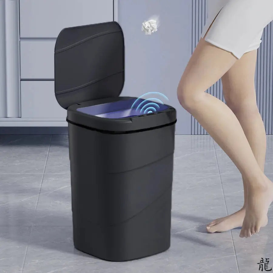 Smart sensor trash can with touchless lid, black plastic, battery powered for bathroom or office.