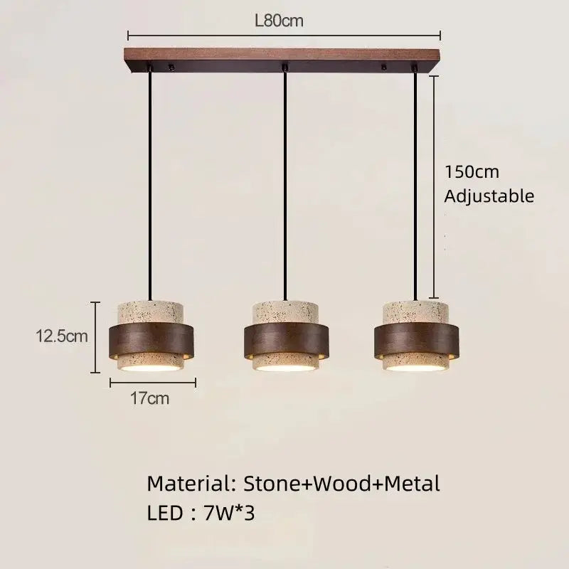 Three pendant lamps on a wood bar; stone, wood and metal fixtures with 7W LED each, adjustable up to 150 cm.