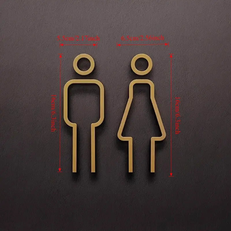 Bathroom sign set by Simples Market featuring two 2D gold figures for men and women for wall decor.