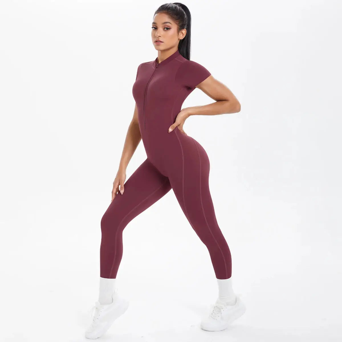 Women's burgundy short-sleeve fitness jumpsuit with front zipper, one-piece bodycon style.