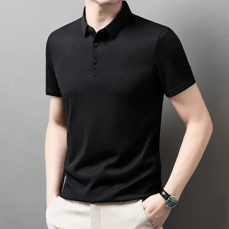 Men's black textured polo shirt with short sleeves and button placket, breathable knit fabric.