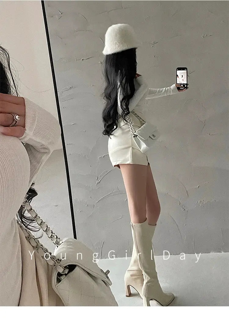 WOMENGAGA white high-waist wrap mini skirt, A-line, worn with knee-high boots and a white handbag in a mirror selfie