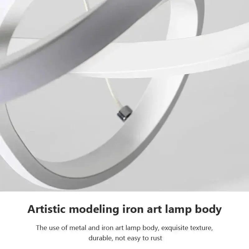 Nordic white LED ceiling pendant lamp with sculptural circular iron rings for modern living, dining, or bedroom spaces