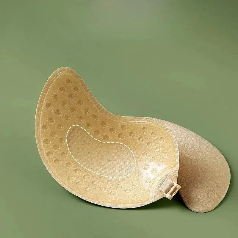 Simples Market invisible strapless adhesive bra in nude silicone, seamless with dotted grip texture and side clasp.