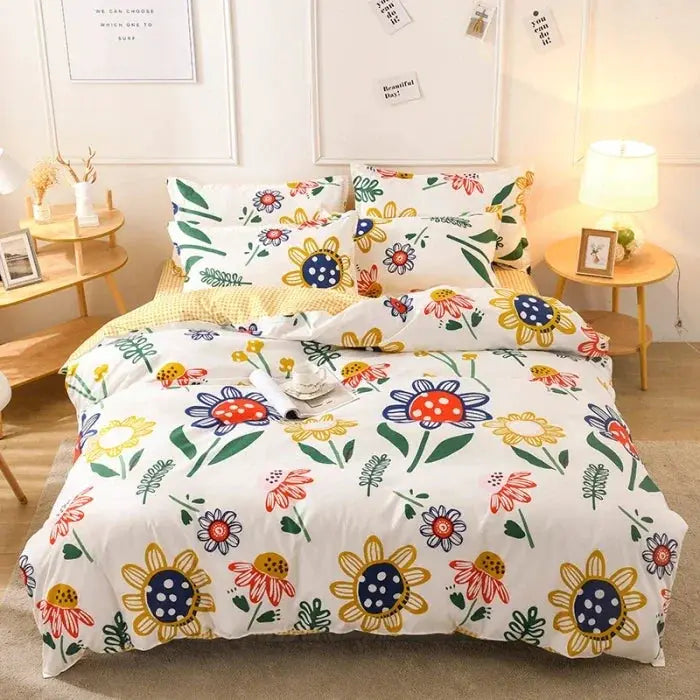 Simples Market four-piece cotton bedding set with white base and bright multicolor floral print.