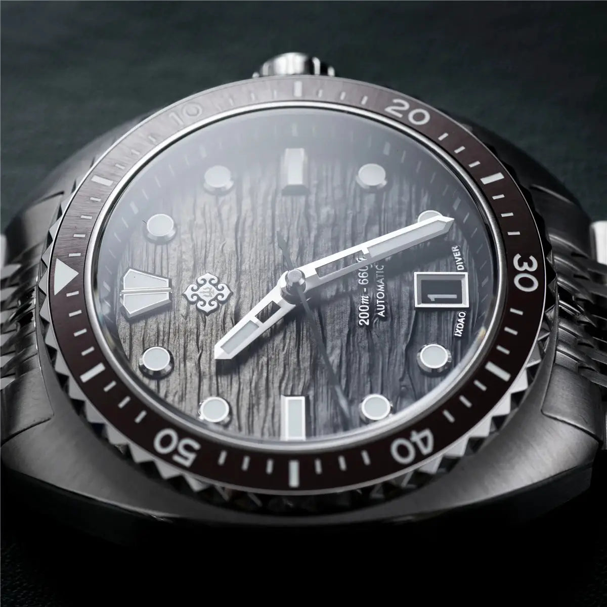 IXDAO IPOSE 2026 men's automatic dive watch by Simples Market, stainless steel case with Poseidon-pattern dial