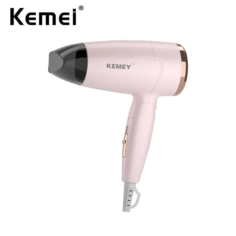 Kemei pink compact handheld hair dryer with gold trim