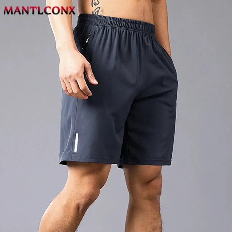 Men's quick-dry jogging shorts by MANTLCONX, dark navy, lightweight breathable fabric
