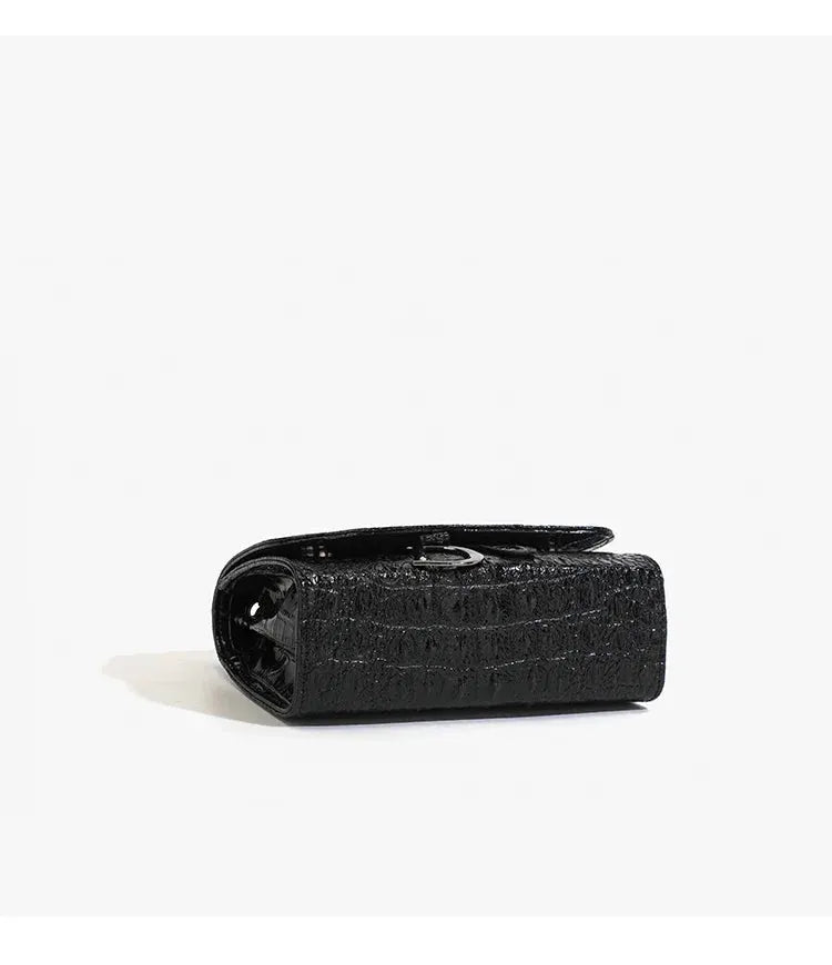 Crossbody handbag by Simples Market, black crocodile-embossed finish.