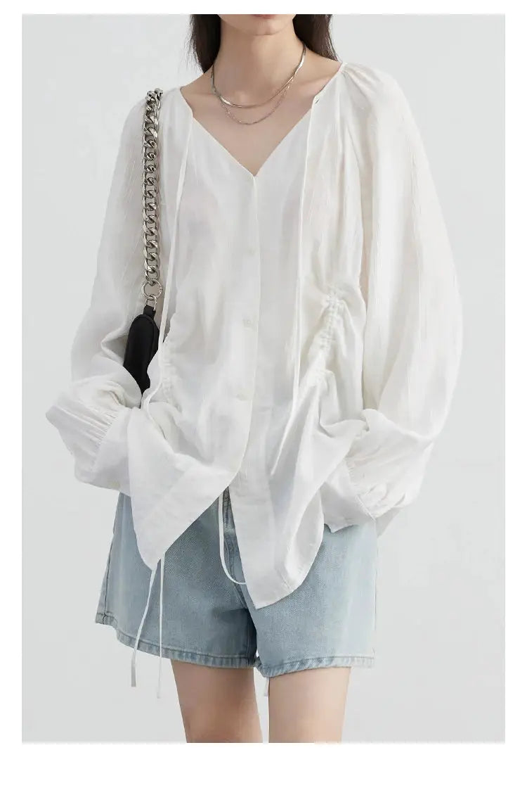 CHIC VEN white loose lace-up V-neck puff-sleeve shirt with button front, paired with denim shorts
