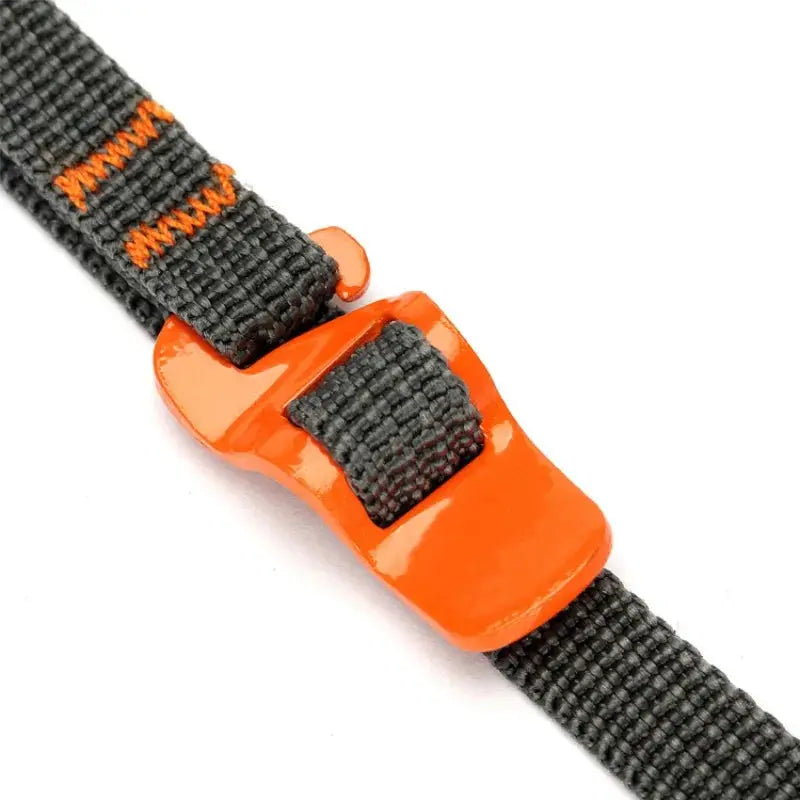 Camping luggage strap with black webbing and orange quick-release buckle