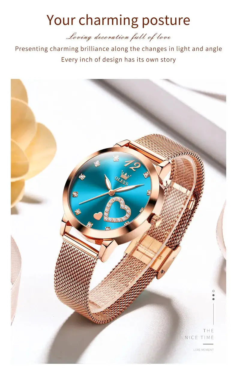 OLEVS 5189 women's quartz wristwatch with rose-gold mesh strap, blue dial, heart design, crystal markers.