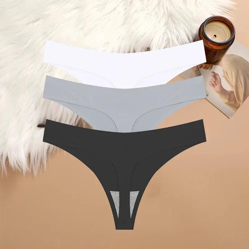 Three-piece G-string underwear set in white, gray, and black; seamless, breathable, low-rise women's thong panties.