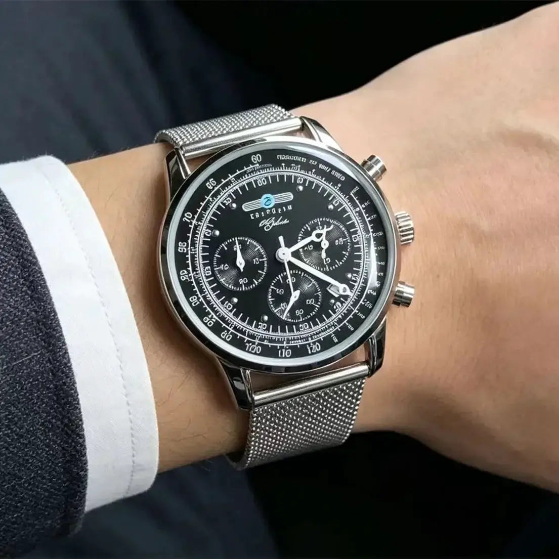 Men's watch Simples Market with black dial and silver mesh strap, chronograph subdials.