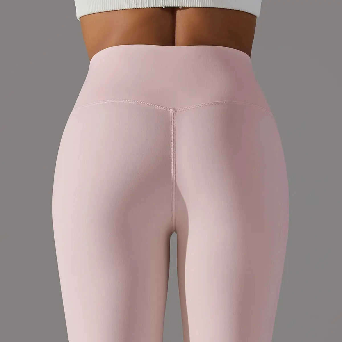 Simples Market high-waist pink leggings for women with center-back seam and a tight fit