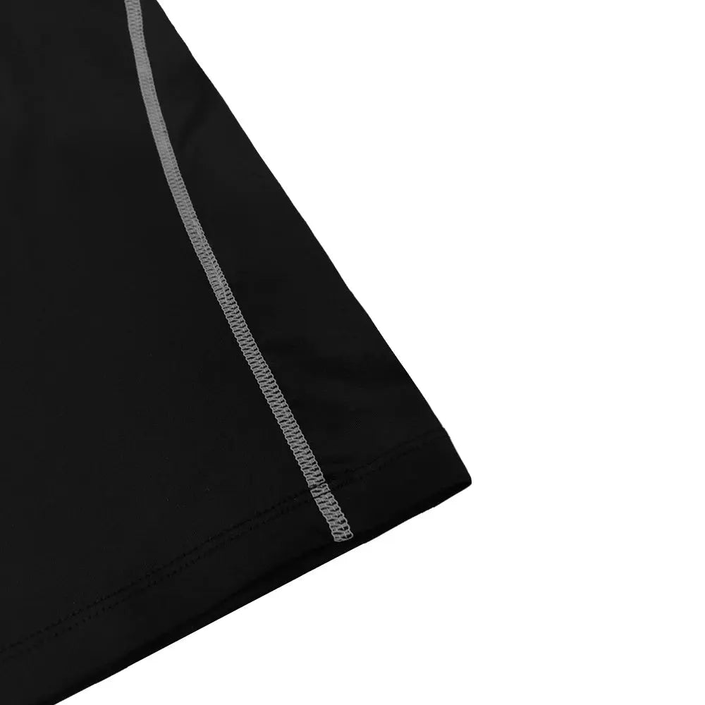 Simples Market men's compression shirt in black with gray flatlock seam detailing