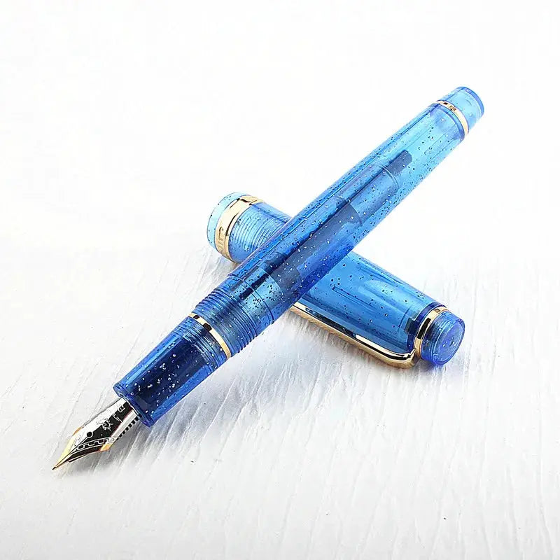 2 blue acrylic Jinhao 82 fountain pens with gold trim and gold nibs