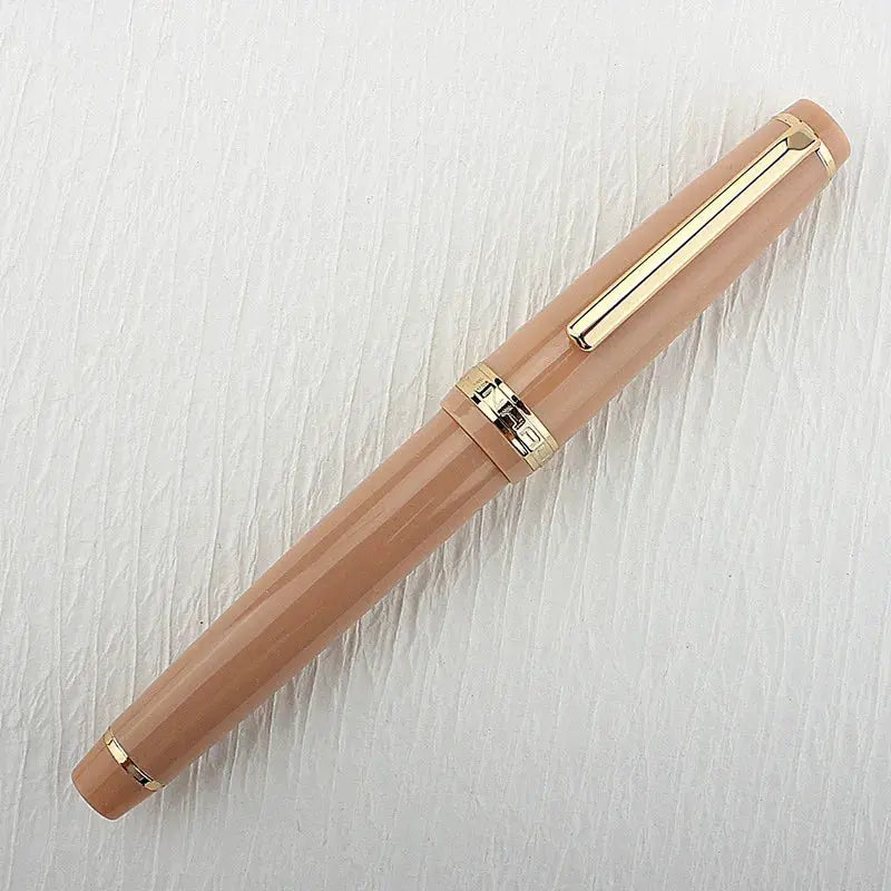 Jinhao 82 fountain pen with acrylic beige body, gold trim and clip, converter included