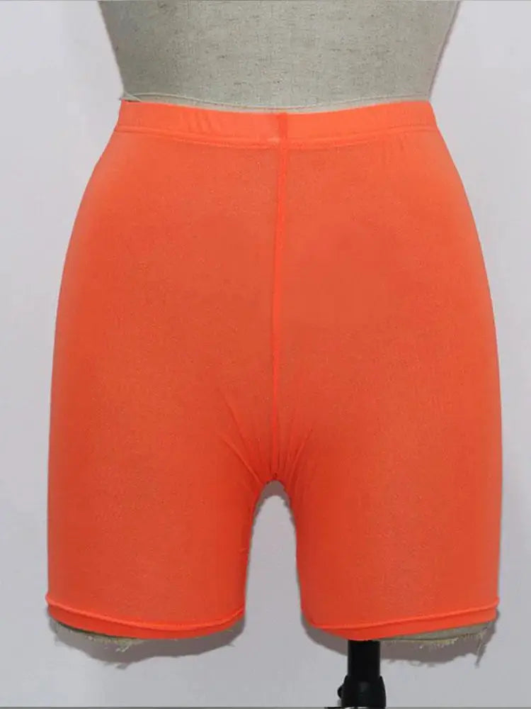 High-waist orange stretch shorts for women, mid-thigh length