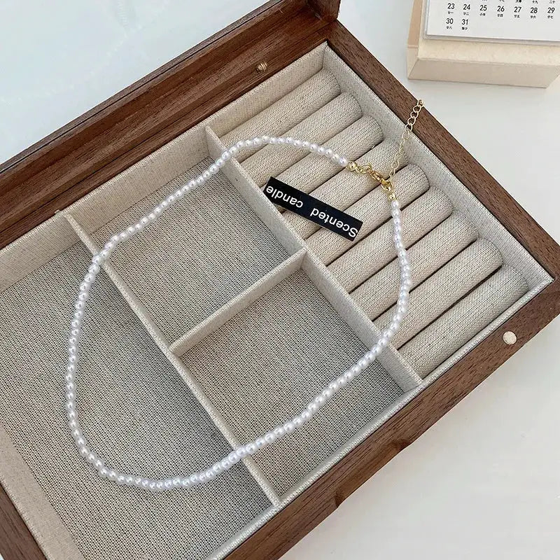 Imitation pearl necklace for women, white collarbone choker with gold clasp in a wooden jewelry box