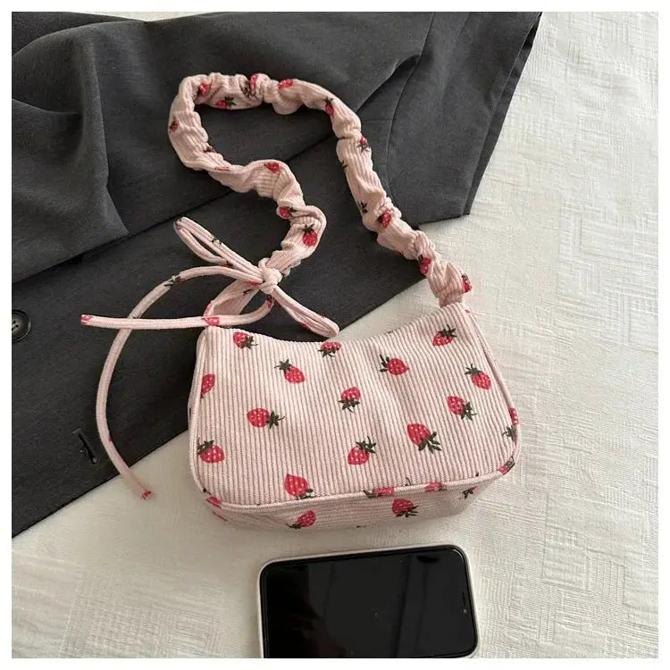 Women small pink corduroy underarm bag with strawberry print; mini shoulder purse
