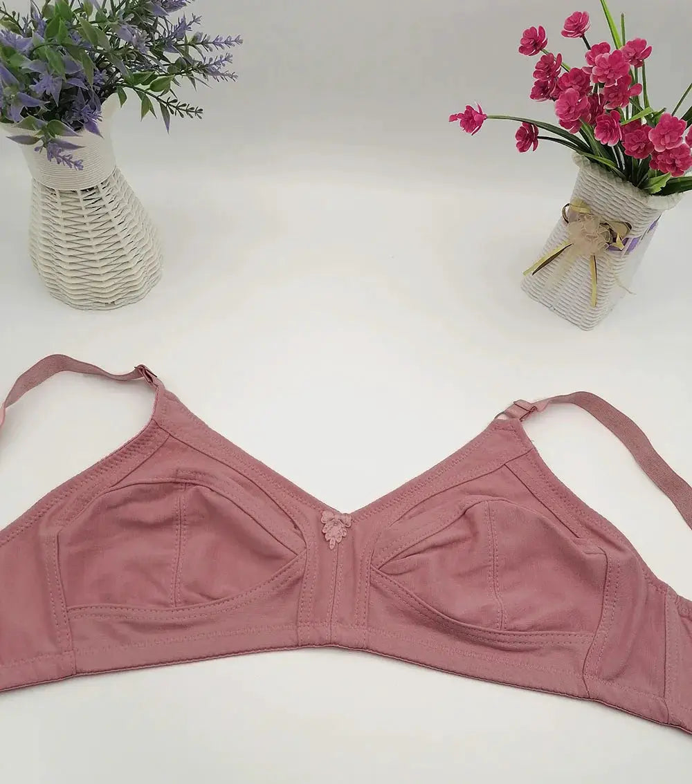 Pink plus-size full-cup bra with adjustable straps, non-padded seamless design
